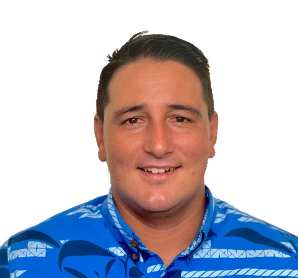 Headshot of Crispin in a blue shirt
