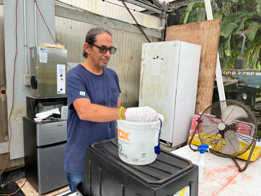 Randall conducting ozone trials for glyphosate degradation project in the greenhouse.