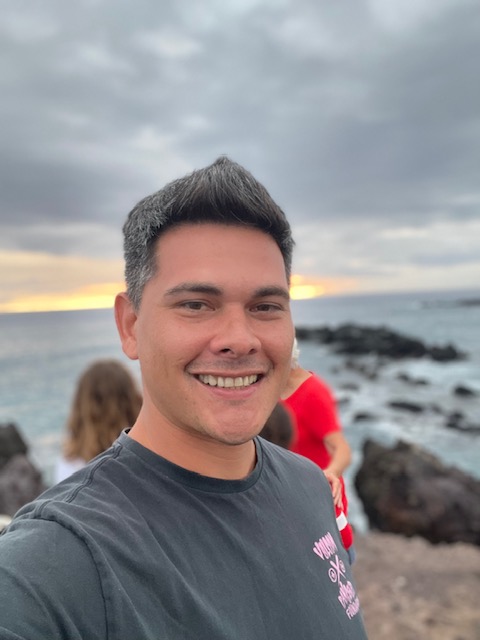 Matt takes a selfie in front of the ocean