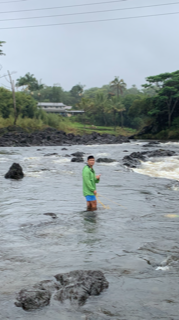 Walter stands in a stream