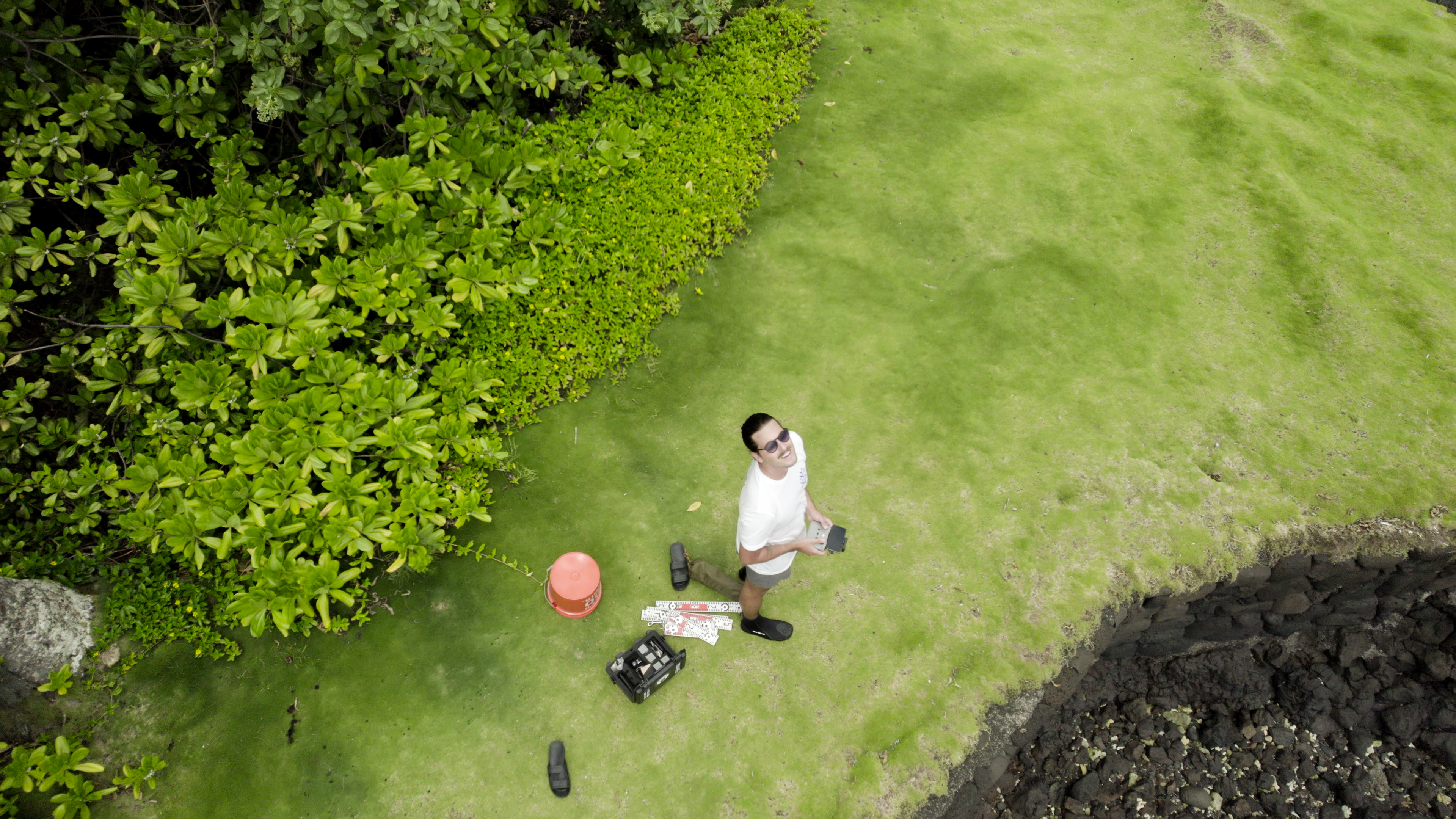 Picture of Alex in the field taken from a drone